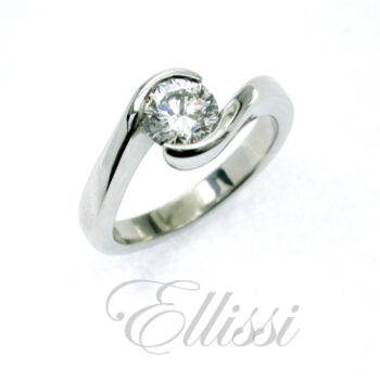 "Leo" Curved band solitaire diamond ring.