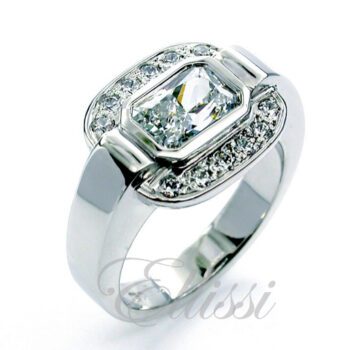 "Bright" unusual Radiant cut diamond halo ring.